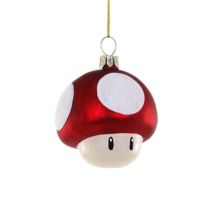 Red and white mushroom-shaped ornament on a white background