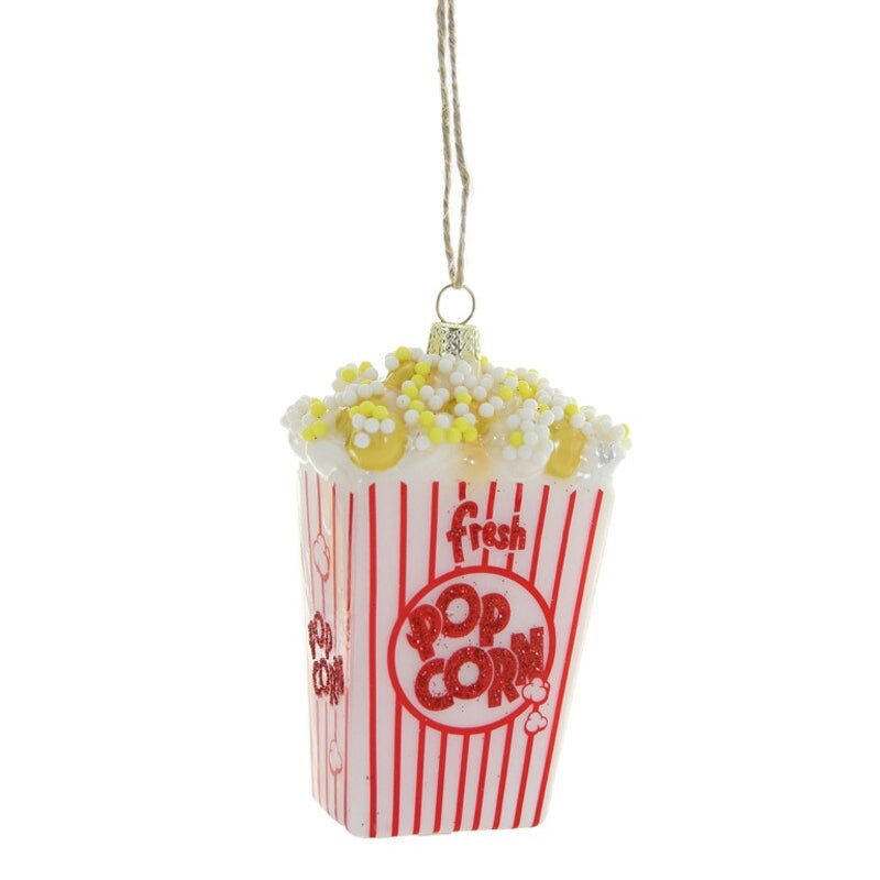 Popcorn container ornament with popcorn on a white background
