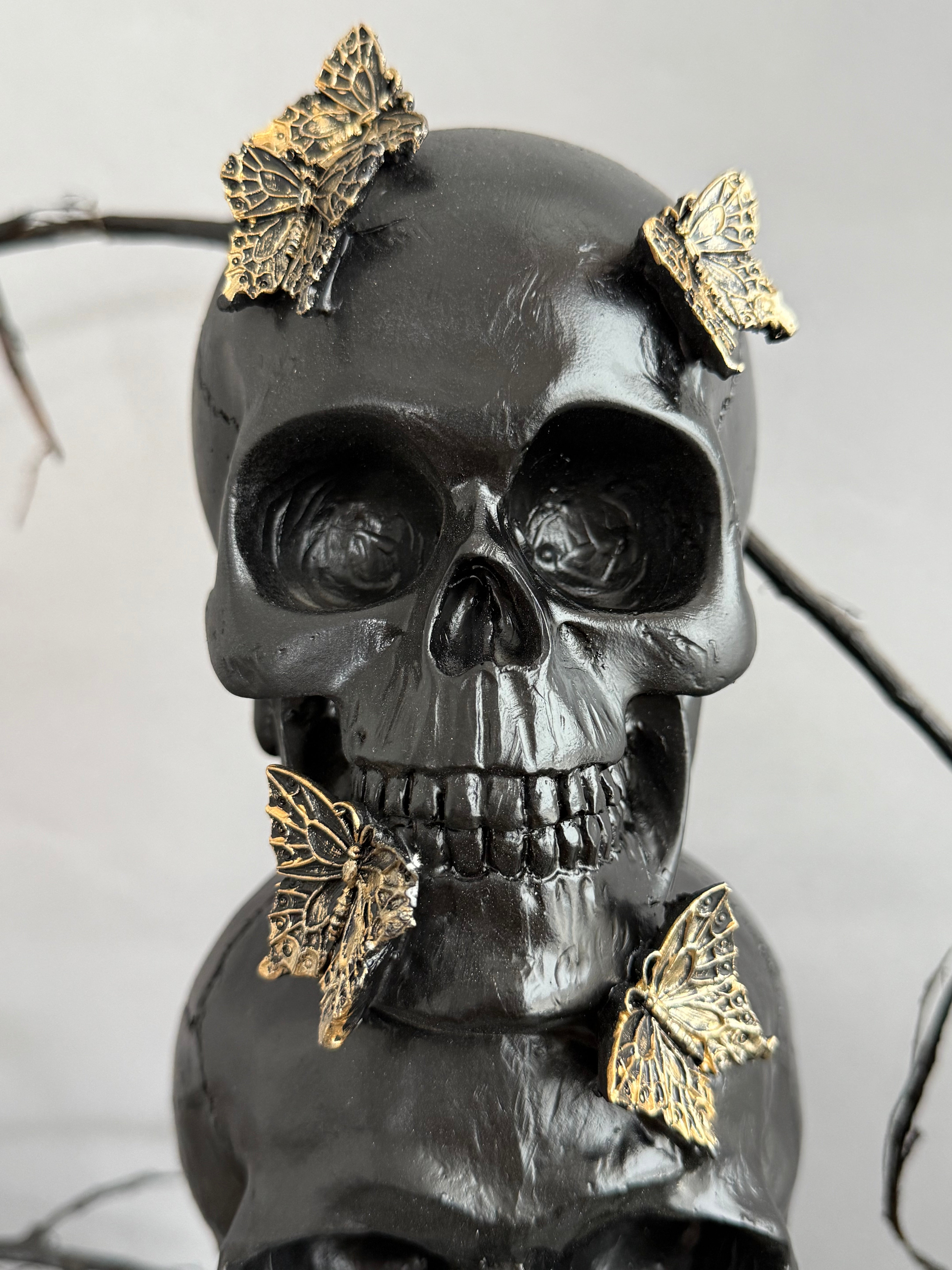 3 Stacked Skulls with Gold Butterflies