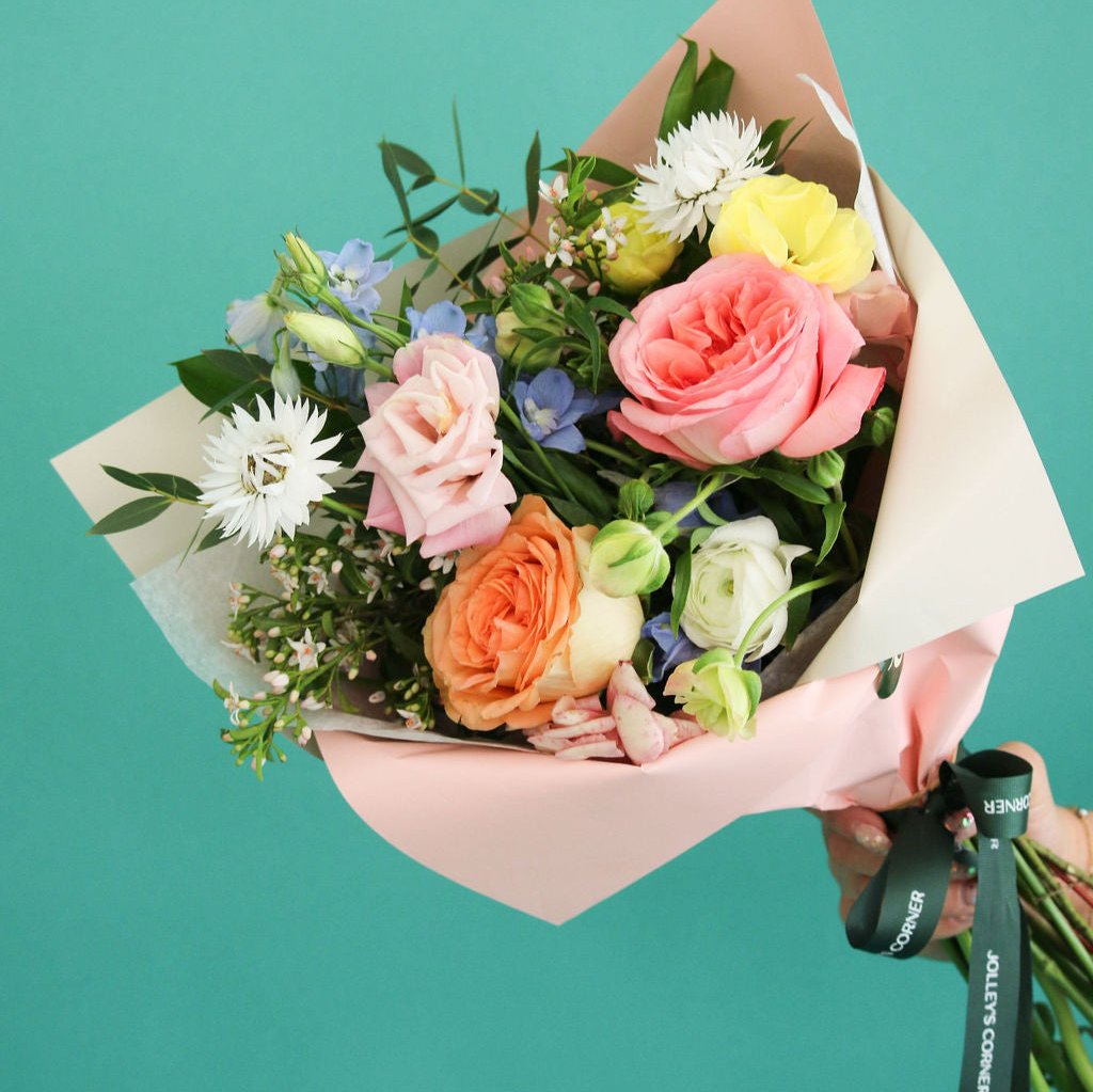 Colorful roses, greenery flowers bouquet.