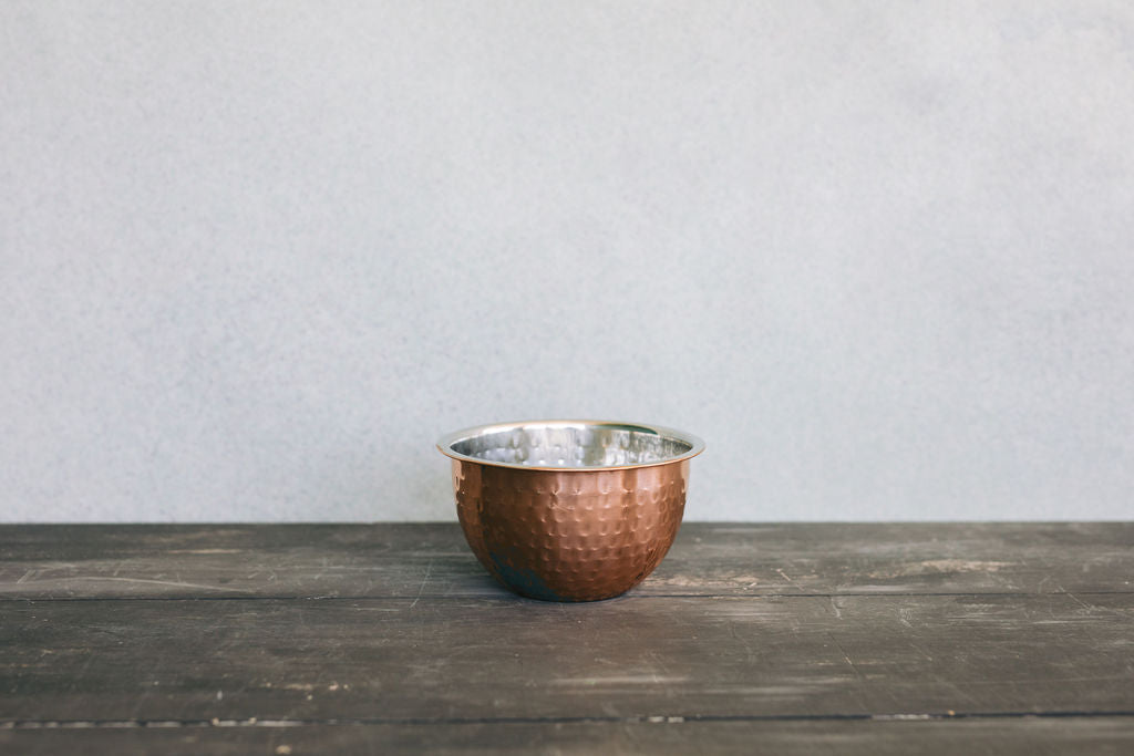 Product shoot of different sizes of the hammered copper bowl.