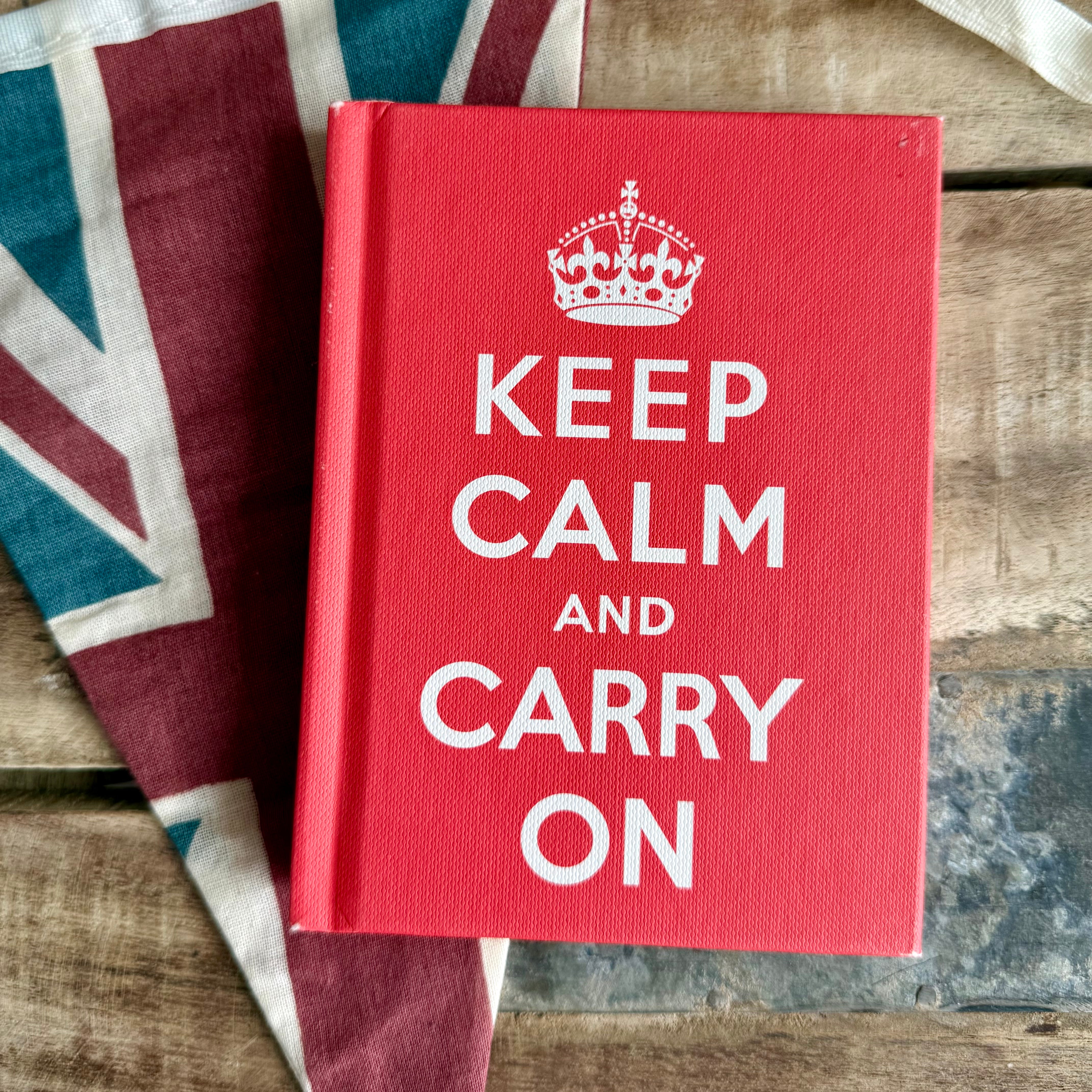 Product shoot of keep calm and carry on mini pocket book.