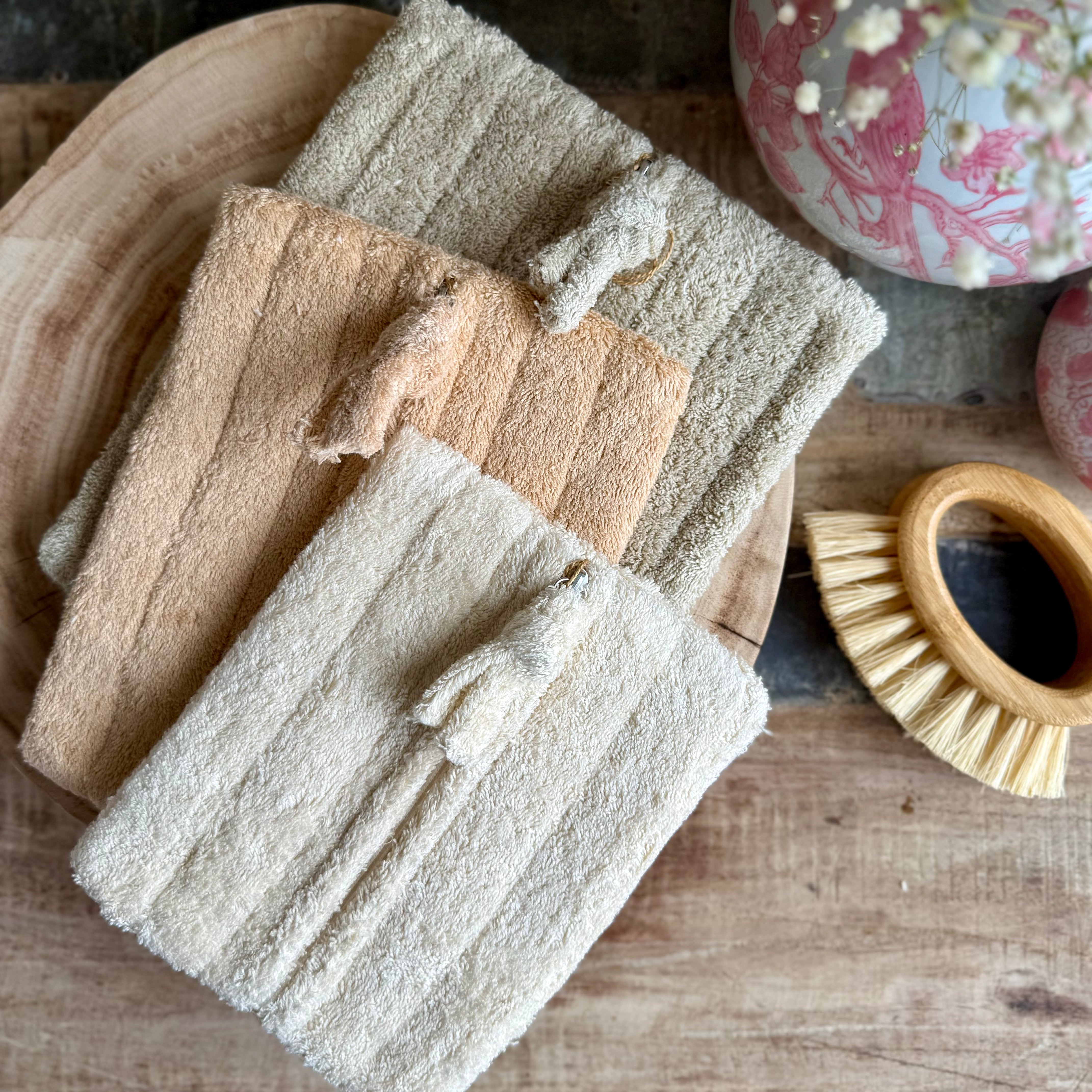 Product shoot of quilted cotton terry zip pouches.
