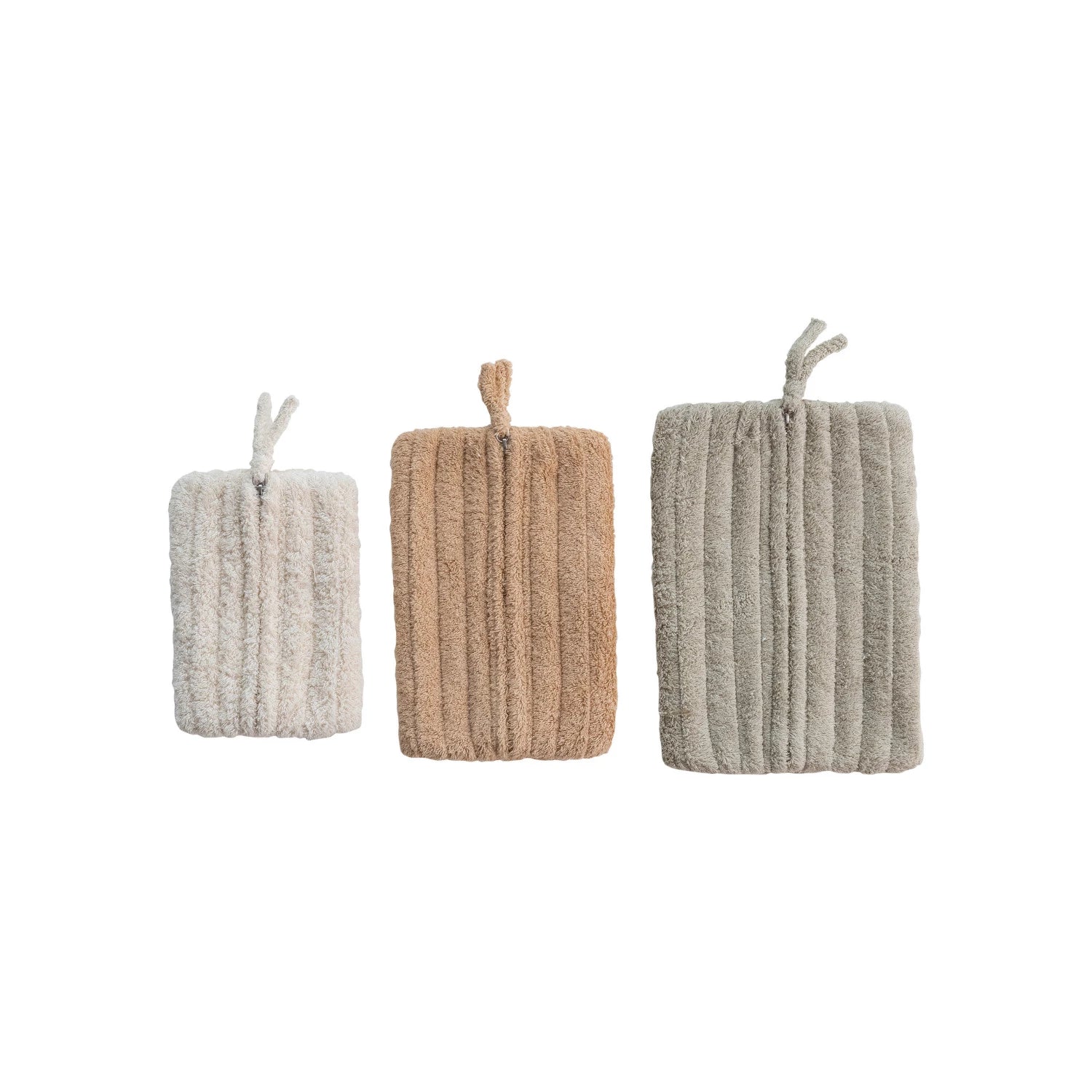 Product shoot of quilted cotton terry zip pouches.