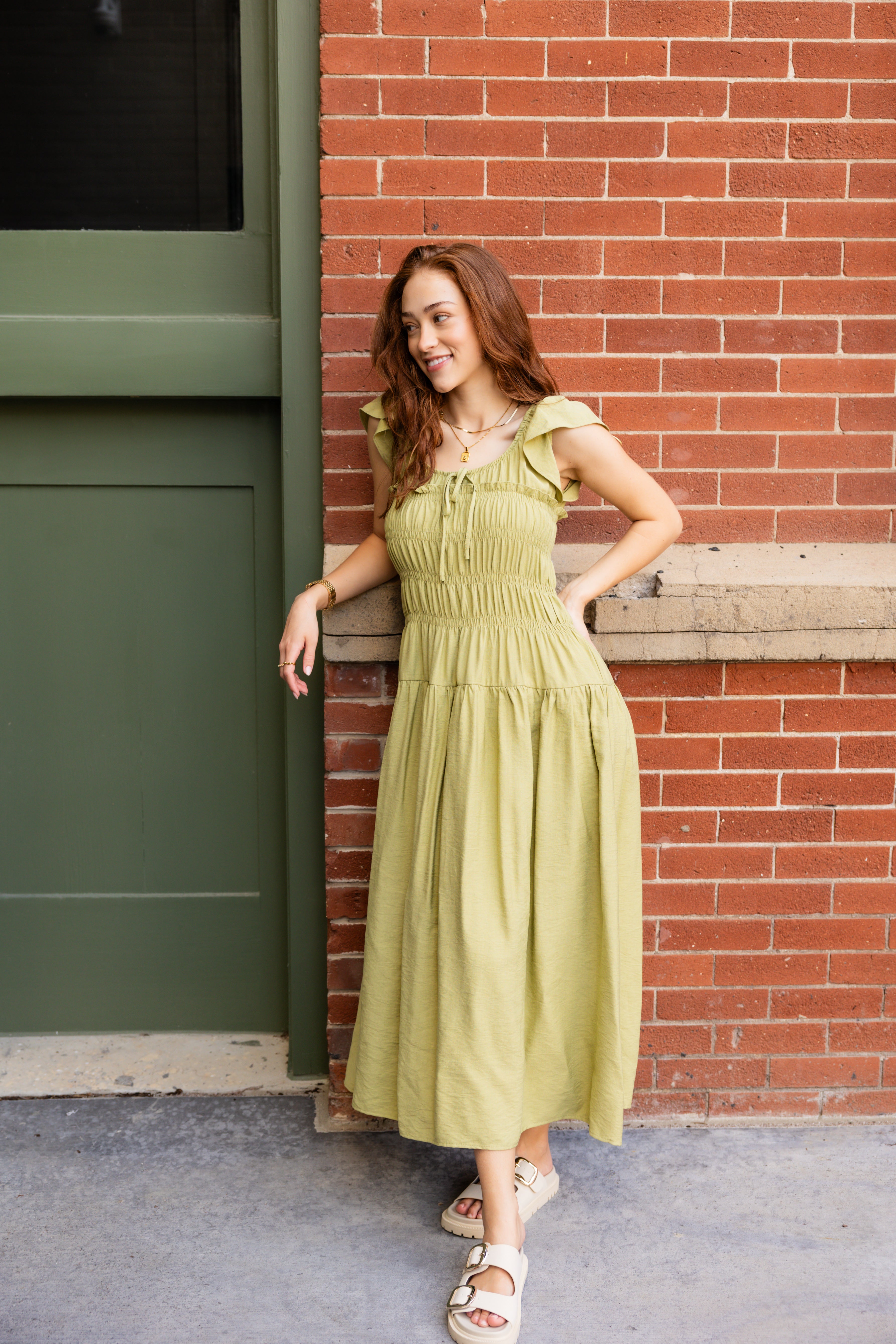 Green ruffle scoop neckline midi dress.