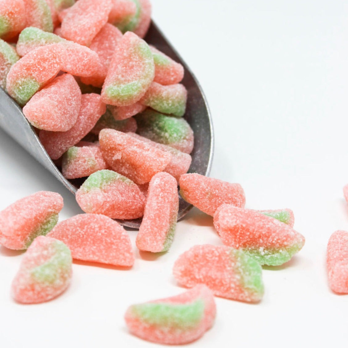 Sour sugared watermelon candy in a scoop
