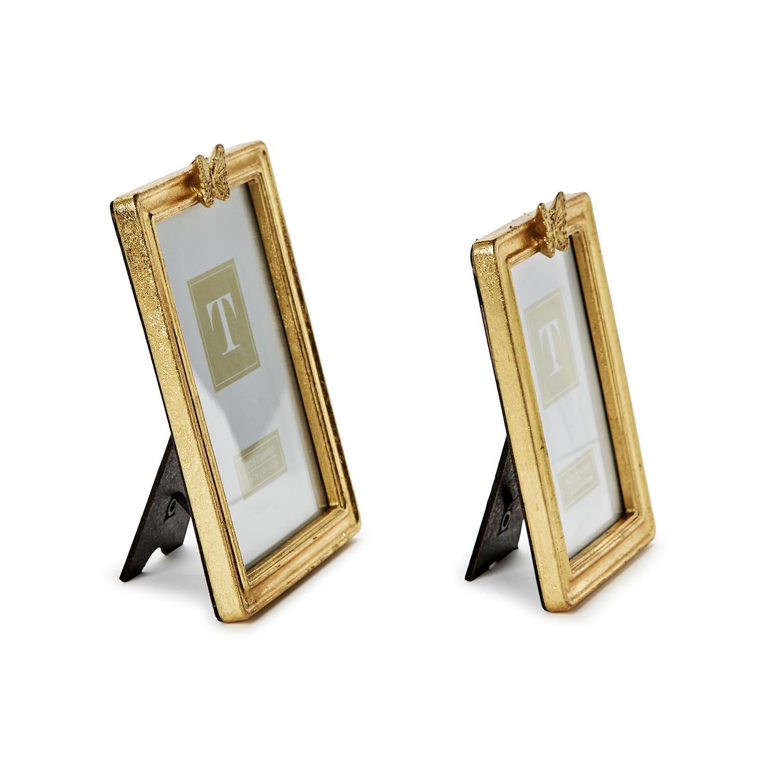 Product shoot of butterfly gold vintage photo frame.