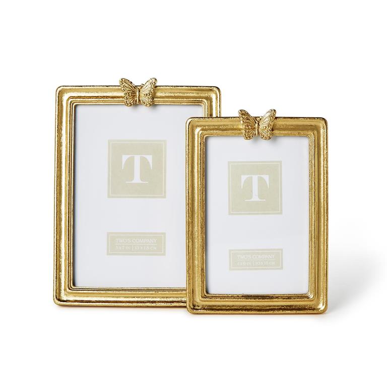 Product shoot of butterfly gold vintage photo frame.