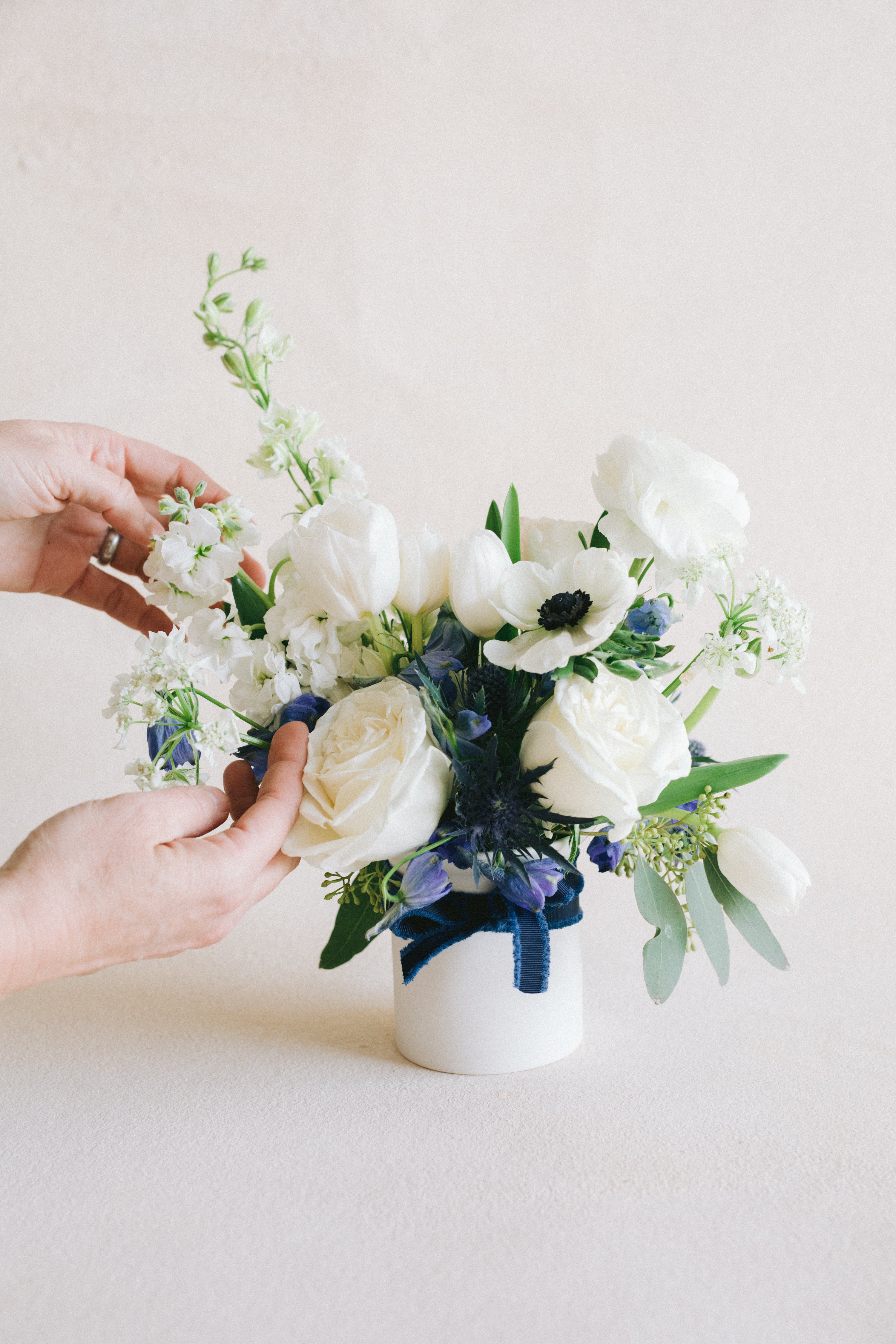 Blue and white floral vase arangement