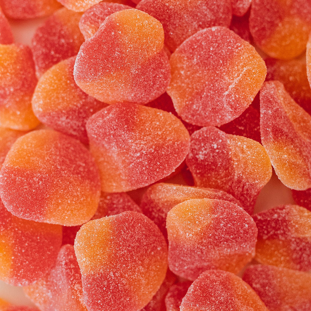 product shoot of sanded sour peaches candy