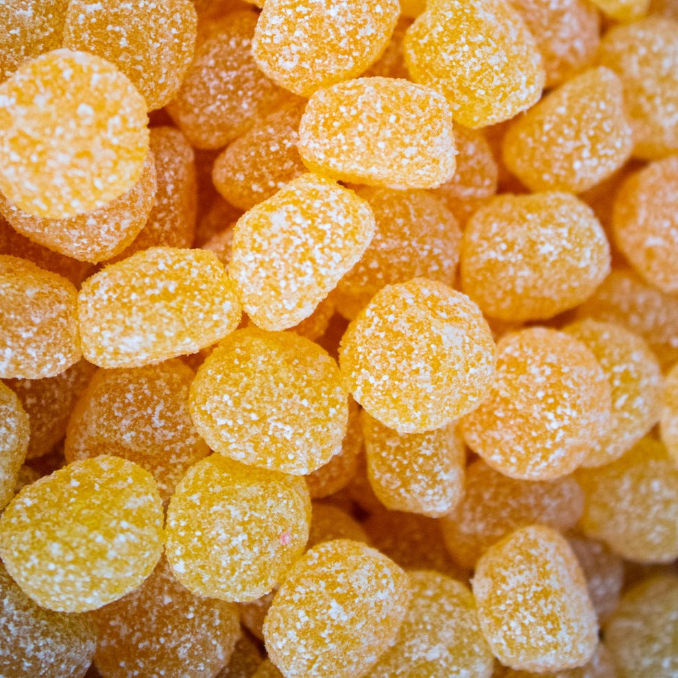 Sugared sour peaches candy close up