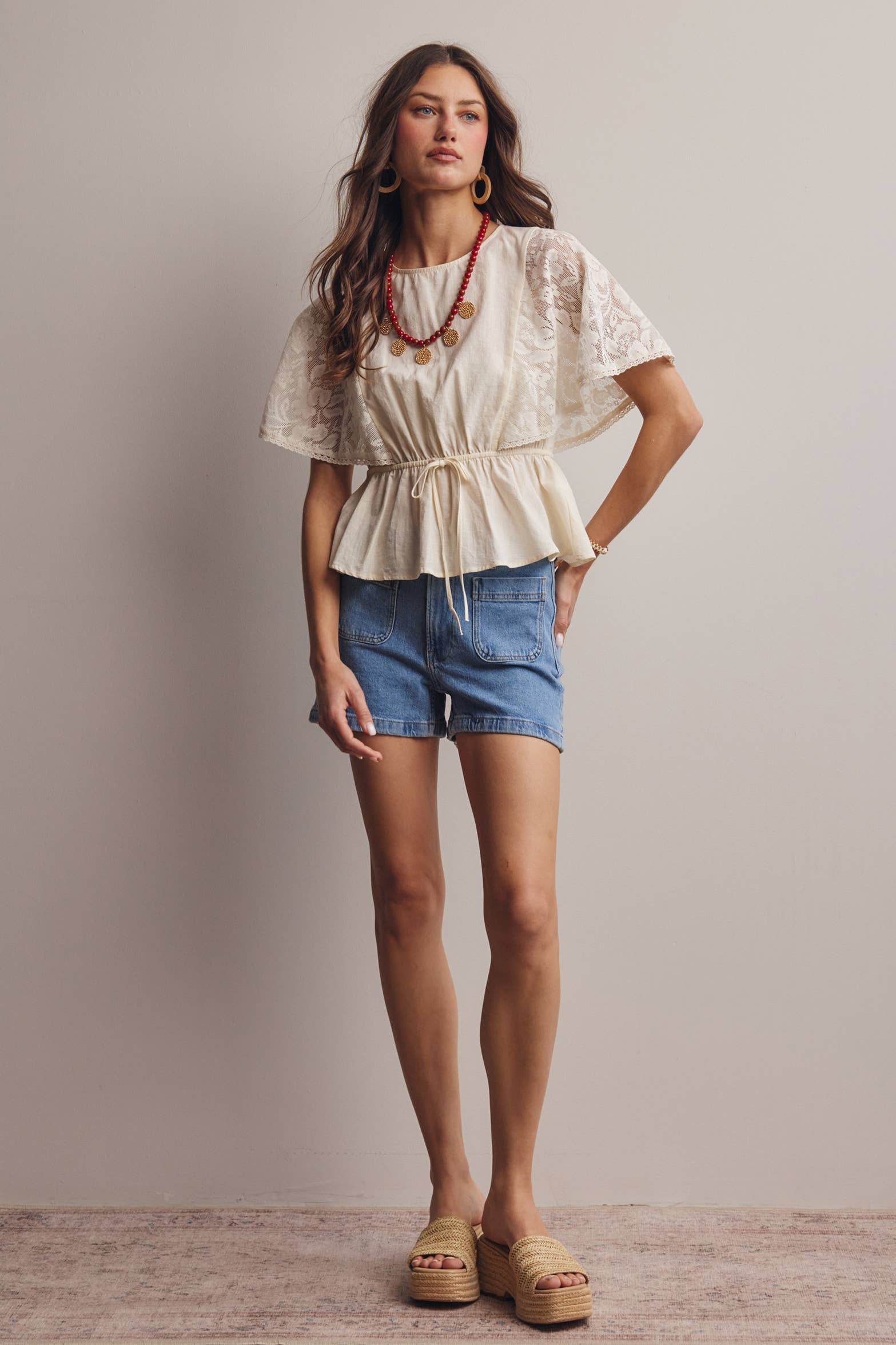 The Iris Peplum Top