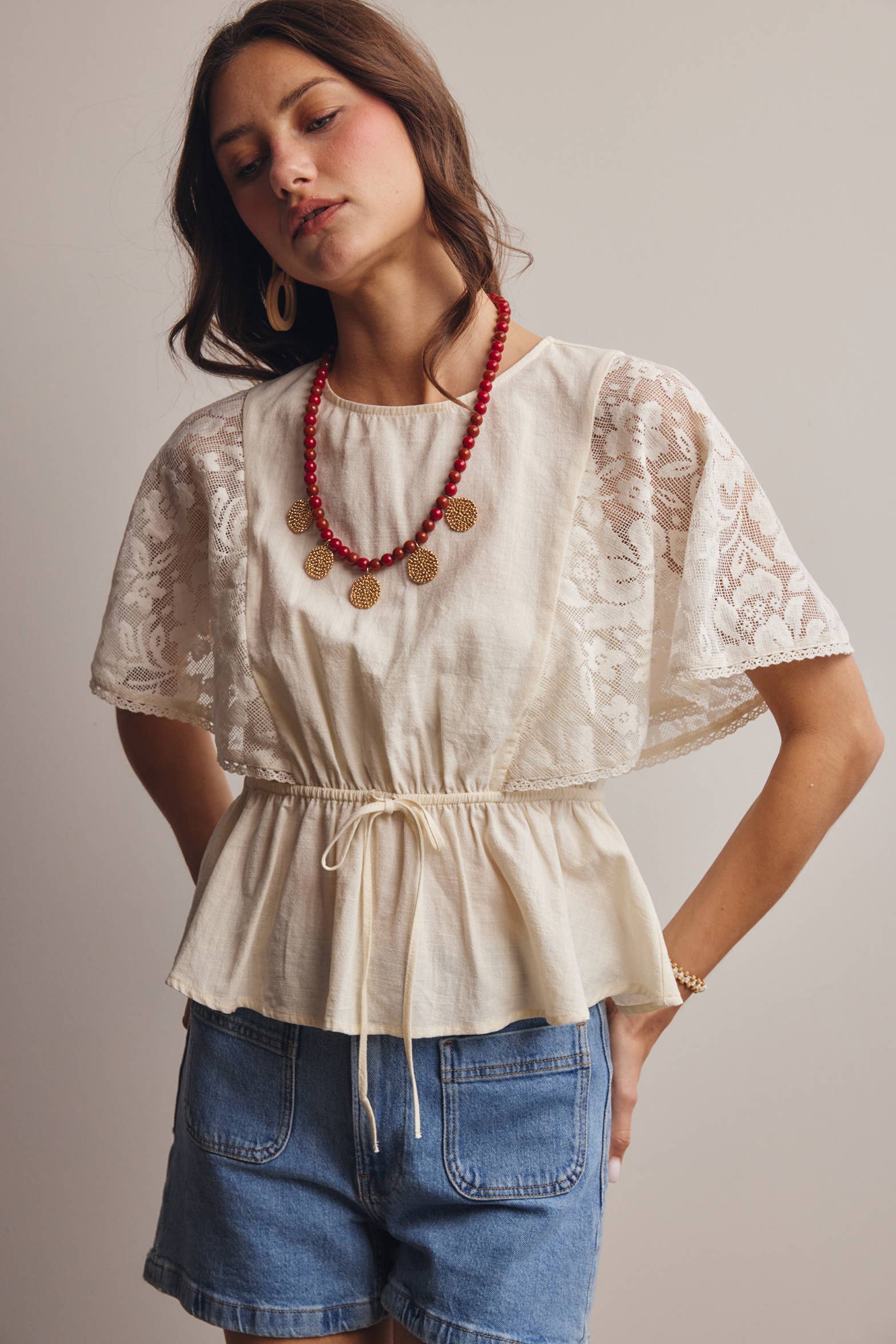 The Iris Peplum Top