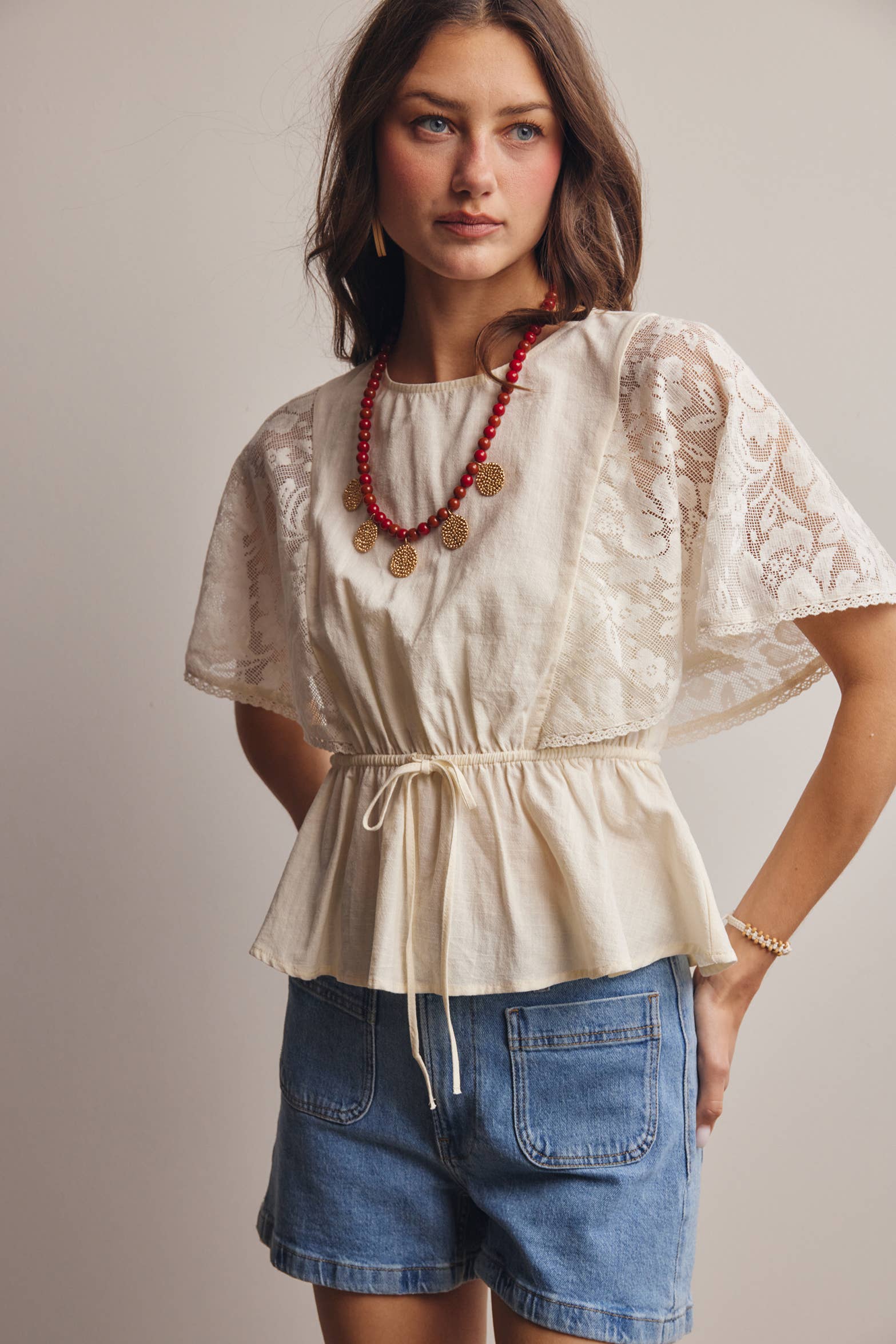 The Iris Peplum Top