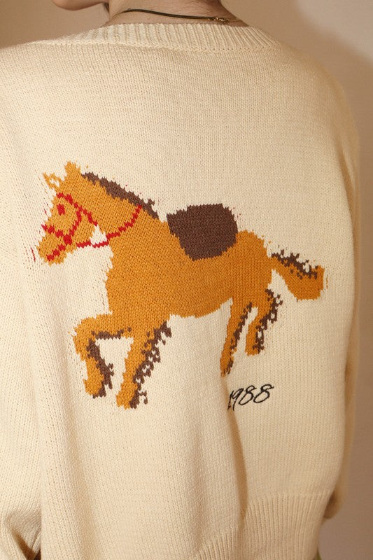 Beige sweater with a horse design on the back