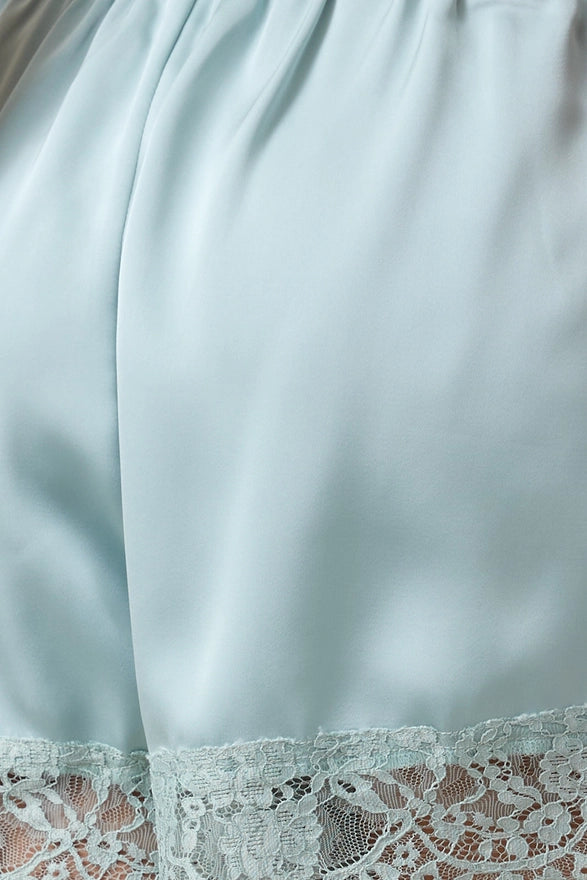 Light blue fabric with lace trim
