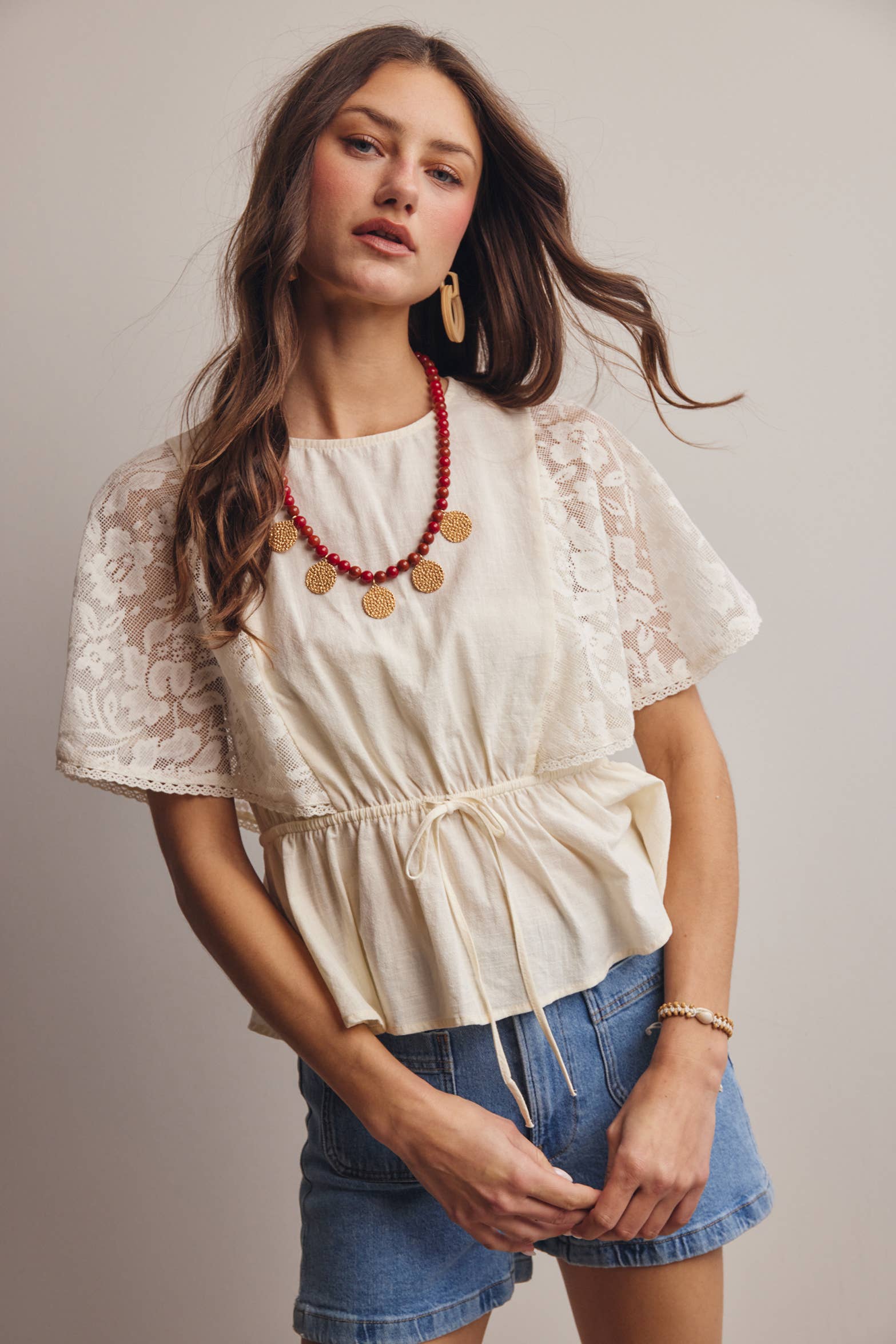 The Iris Peplum Top