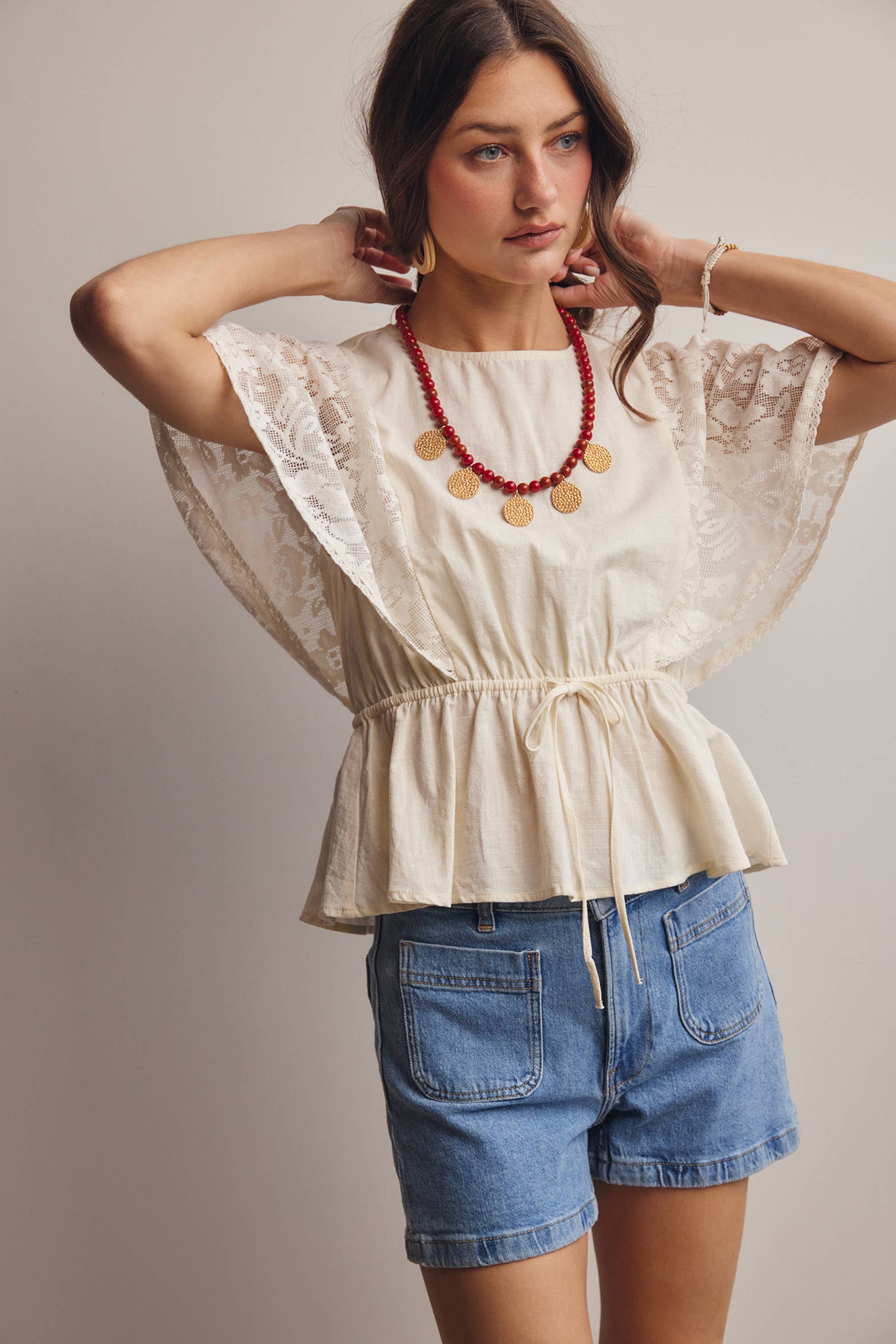 The Iris Peplum Top