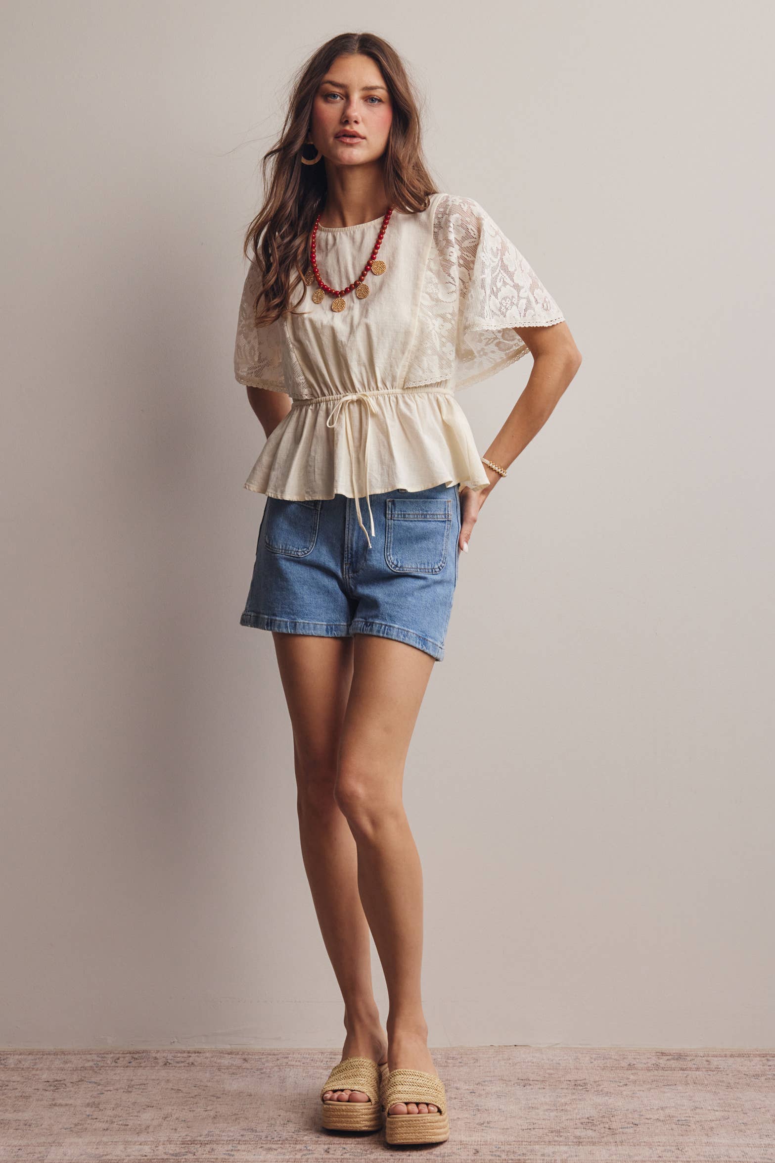 The Iris Peplum Top