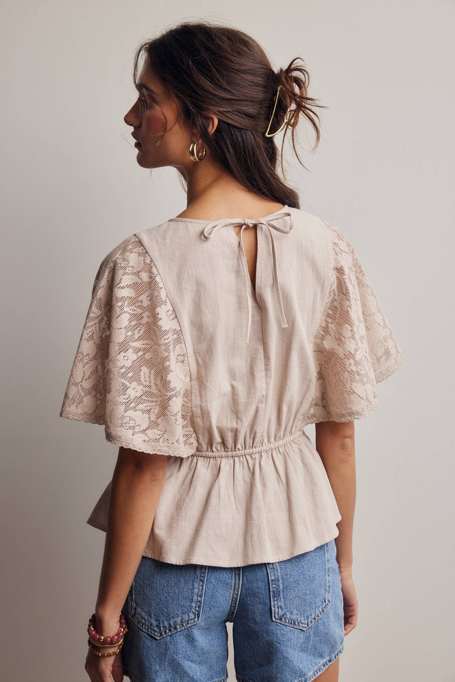 The Iris Peplum Top