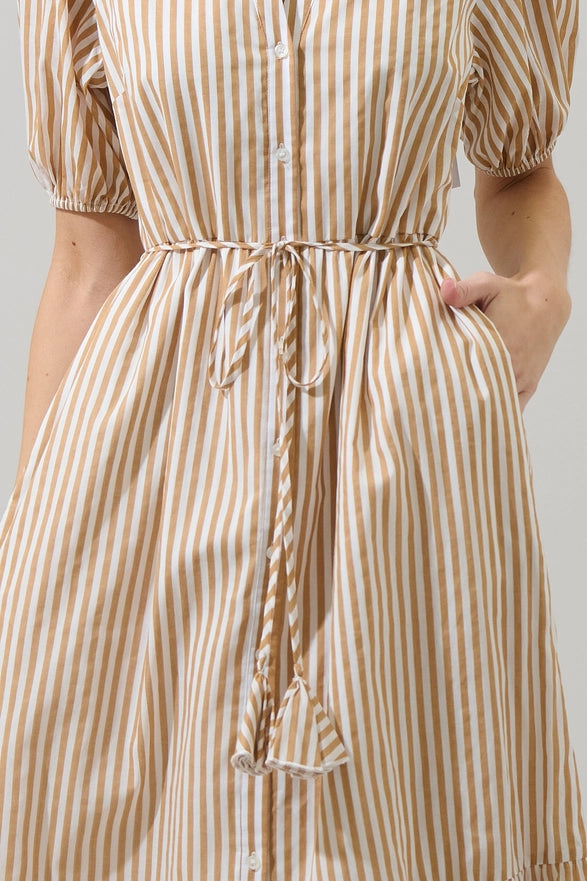 Close-up of a person wearing a beige and white striped dress with a tie waist.