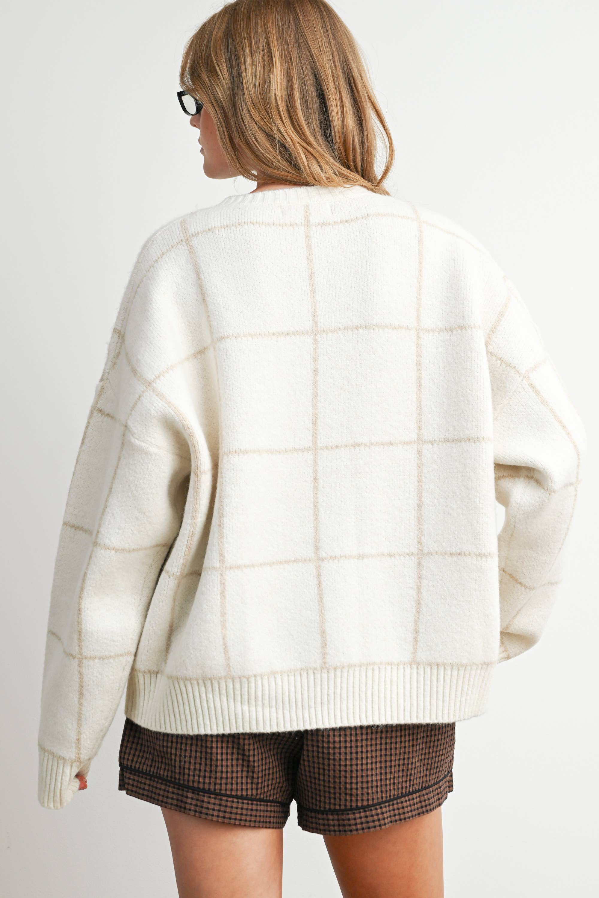 The Lasso Checkered Sweater