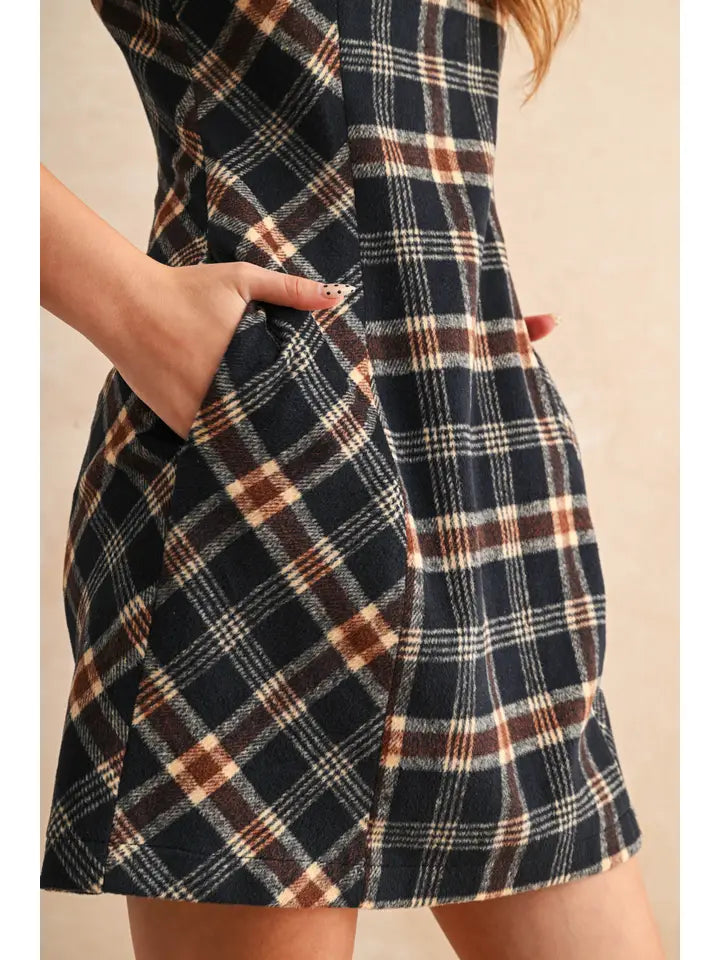 Plaid dress with a beige background