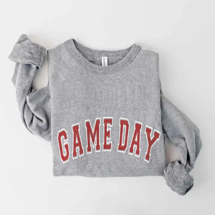 Gray sweatshirt with 'GAMEDAY' text on a white background