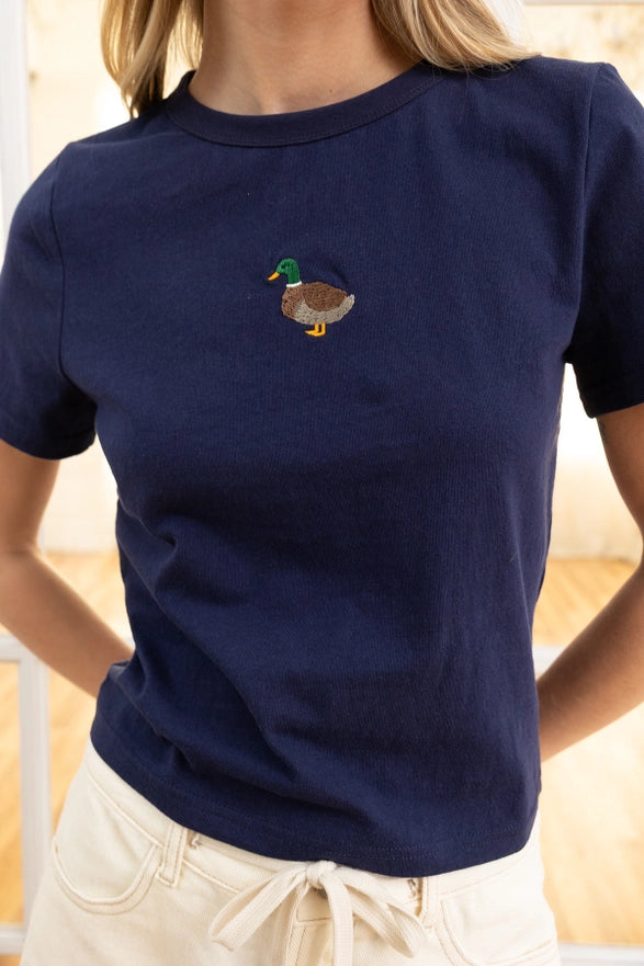 Navy blue t-shirt with a duck embroidery on a plain background