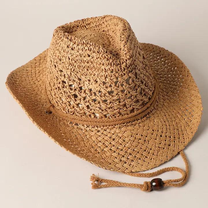 A beige fedora-style sun hat with a wide brim and a ribbon band, crafted from straw material.