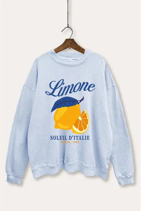 Light blue sweatshirt with lemon graphic and text on a white background