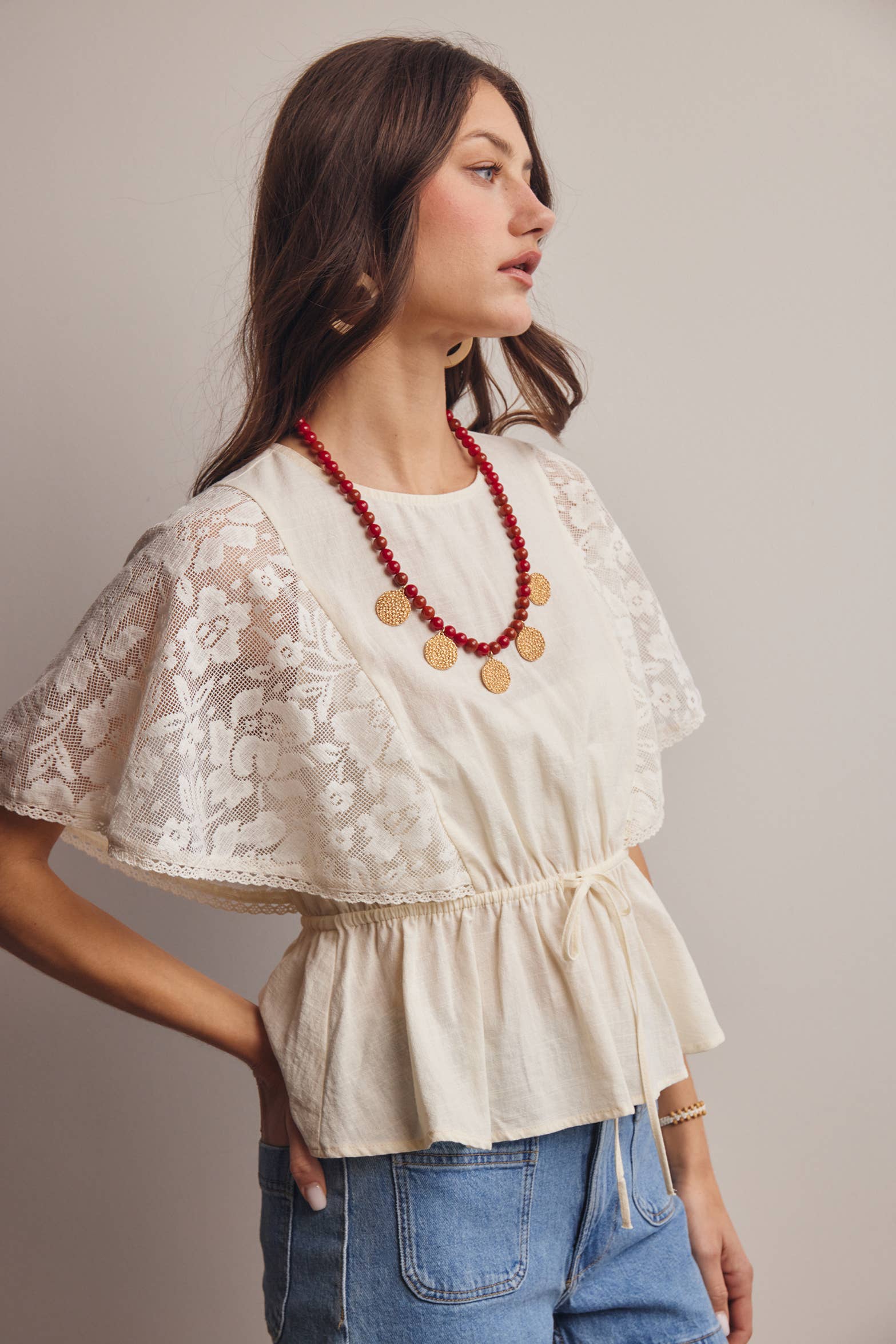 The Iris Peplum Top