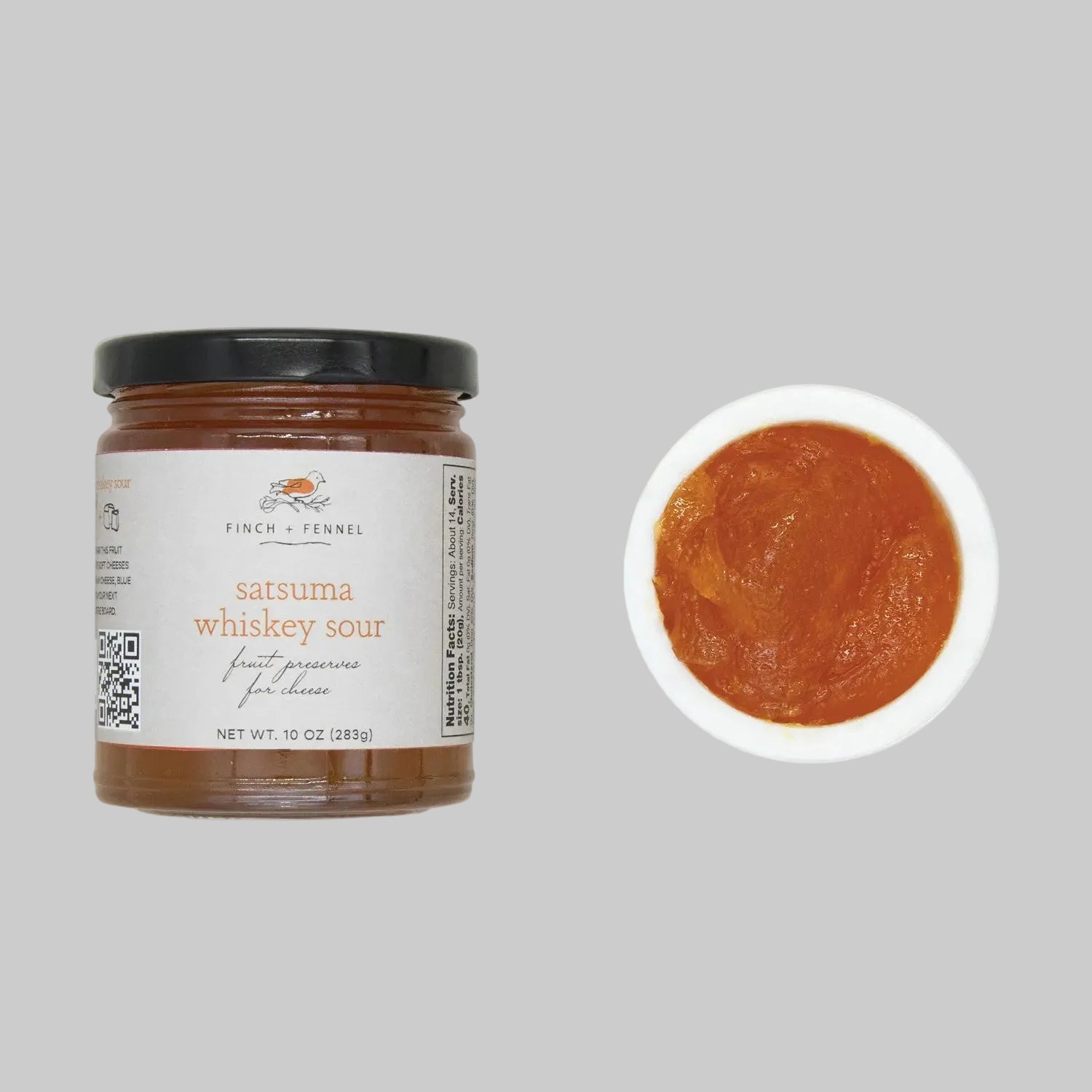 Jar of satsuma whiskey sour with a close-up of the contents on a white background