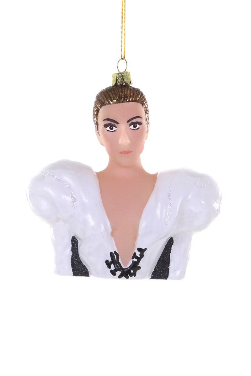 Decorative Christmas ornament of a Celine Dion  in a white outfit with black details on a white background
