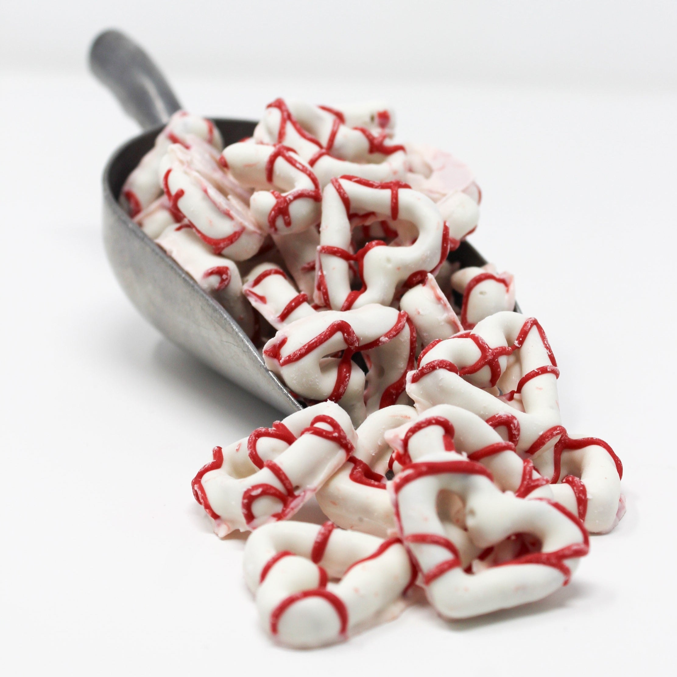 Yogurt valentine heart candy with red frosting.