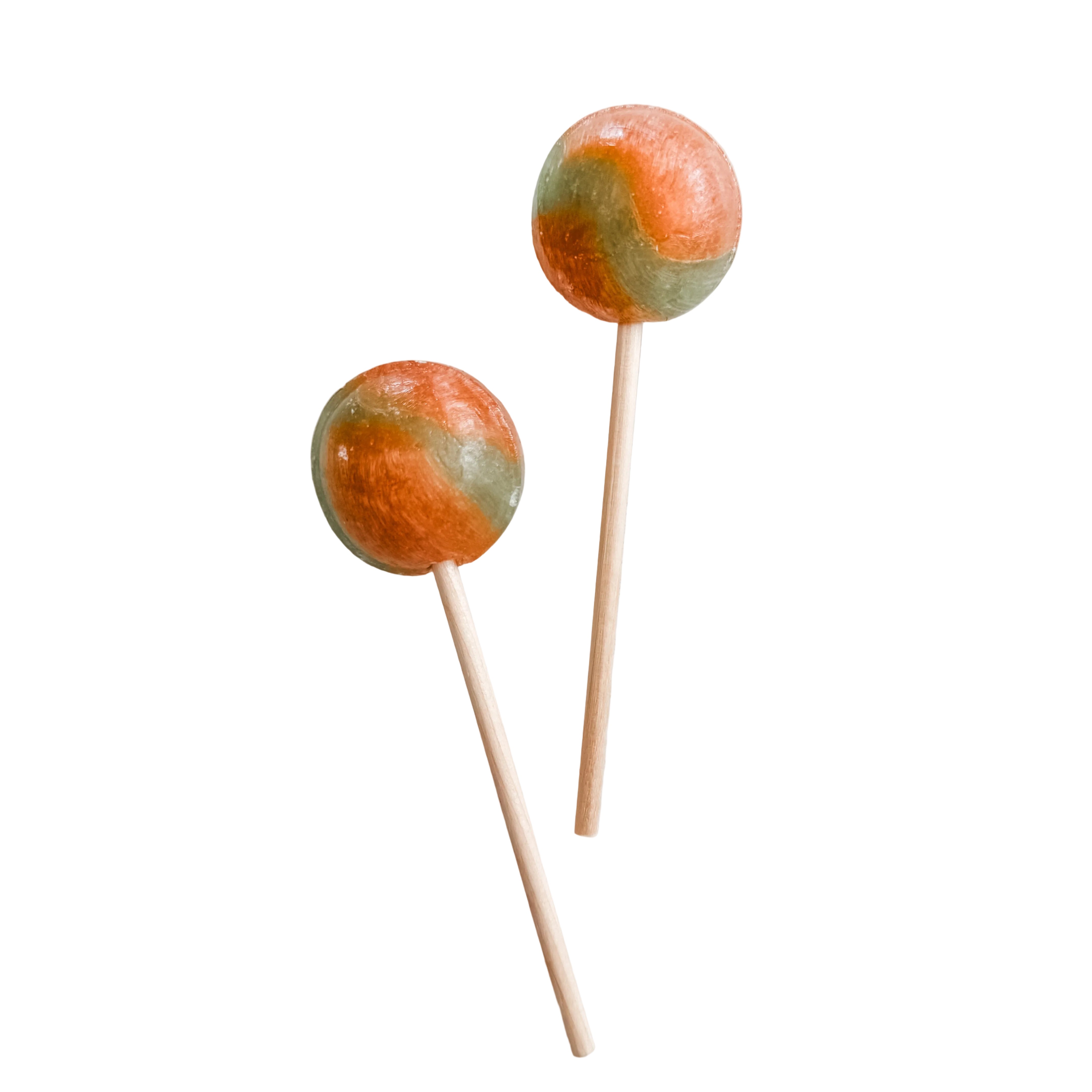A variety of colorful lollipops on sticks, including red, white, blue, green, and pink flavors.
