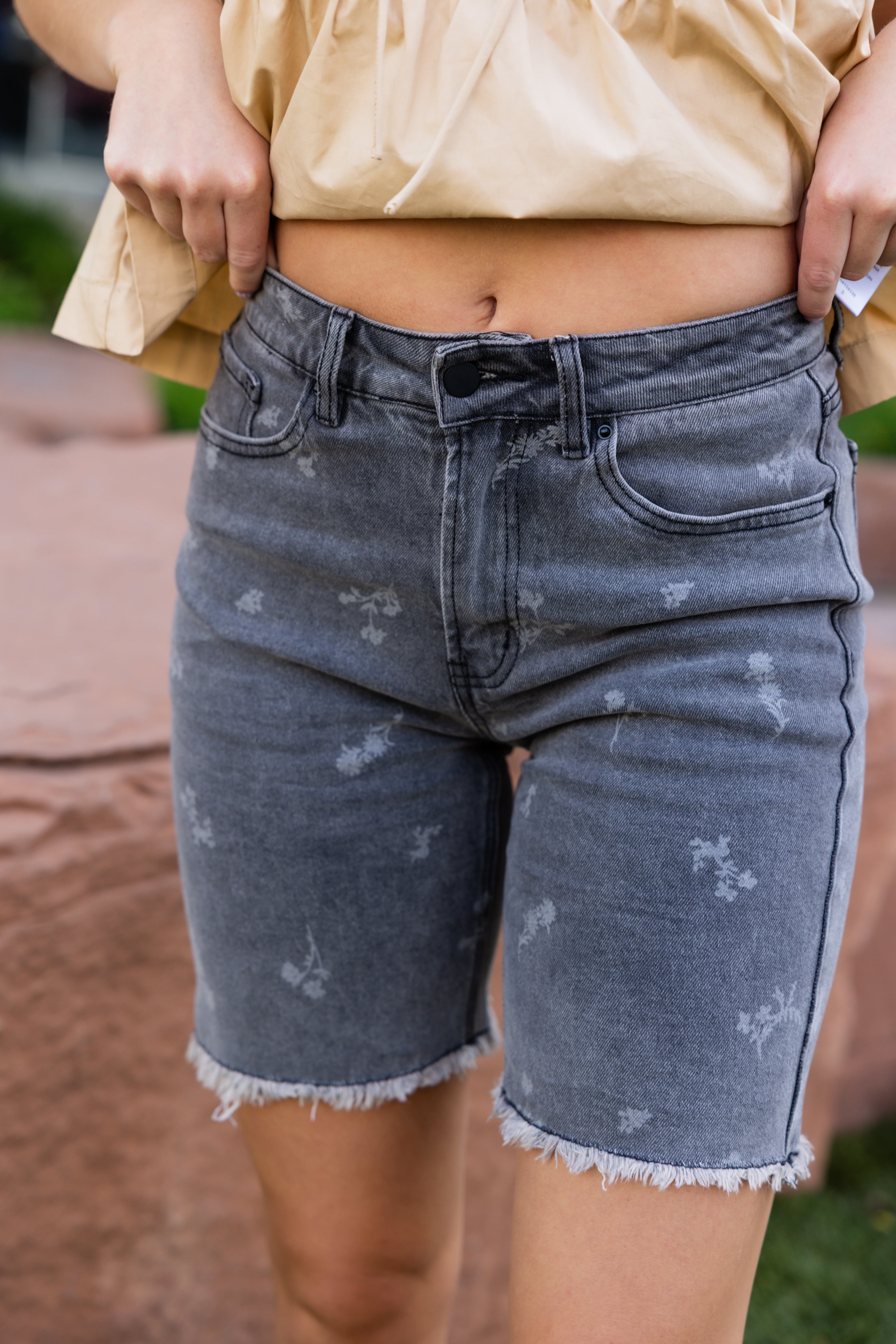 Washed black long shorts with floral design