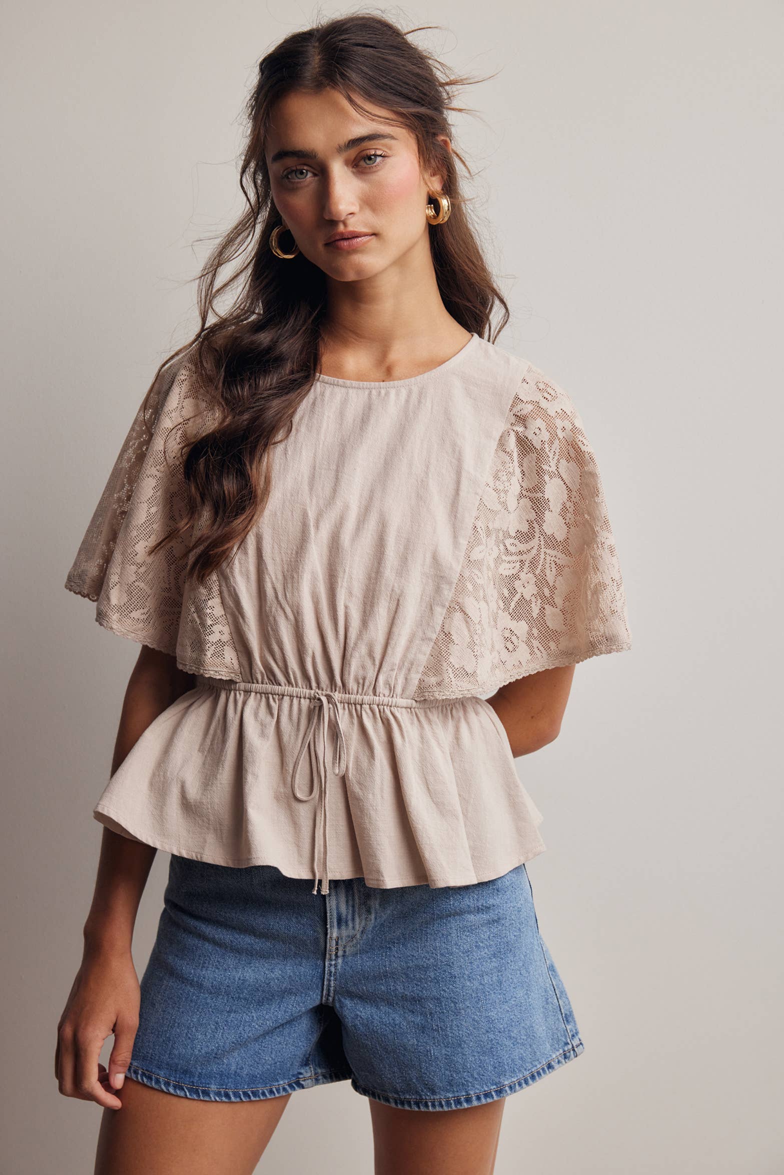 The Iris Peplum Top