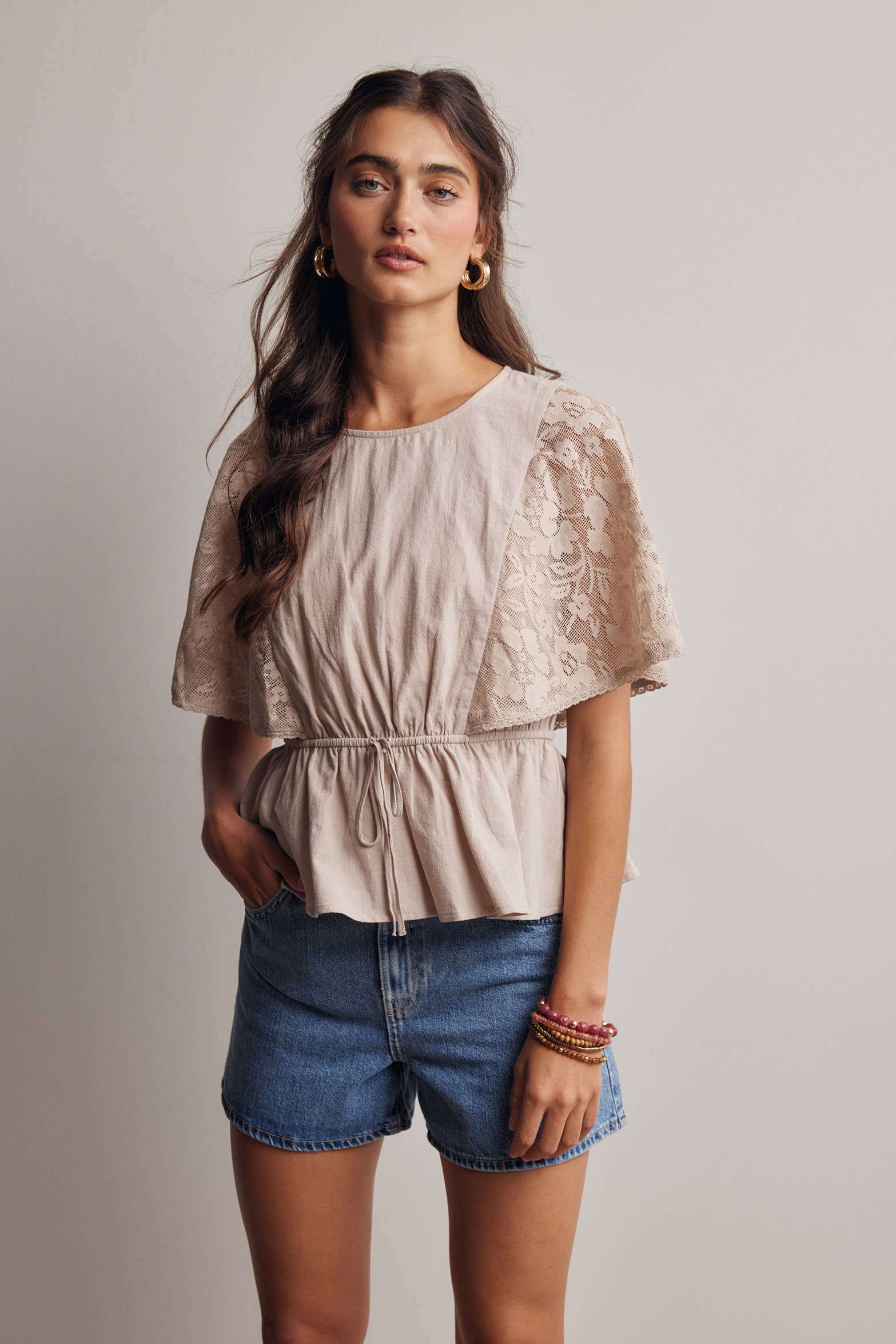 The Iris Peplum Top