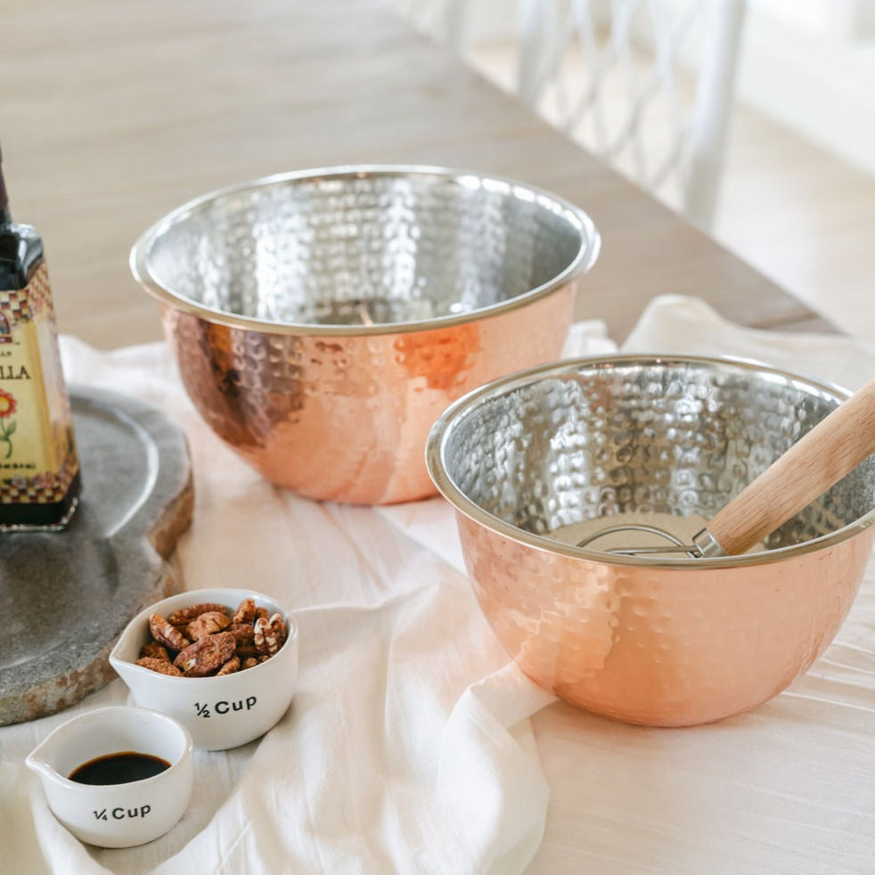 Product shoot of different sizes of the hammered copper bowl.