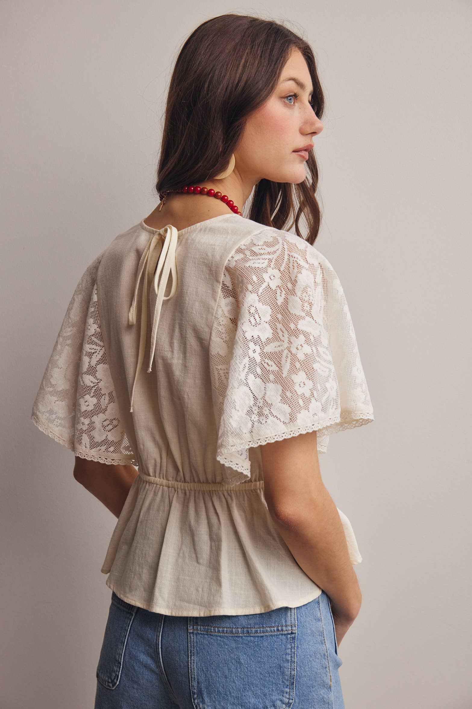 The Iris Peplum Top