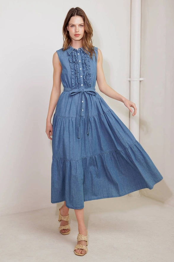 Woman wearing a blue dress with a white background