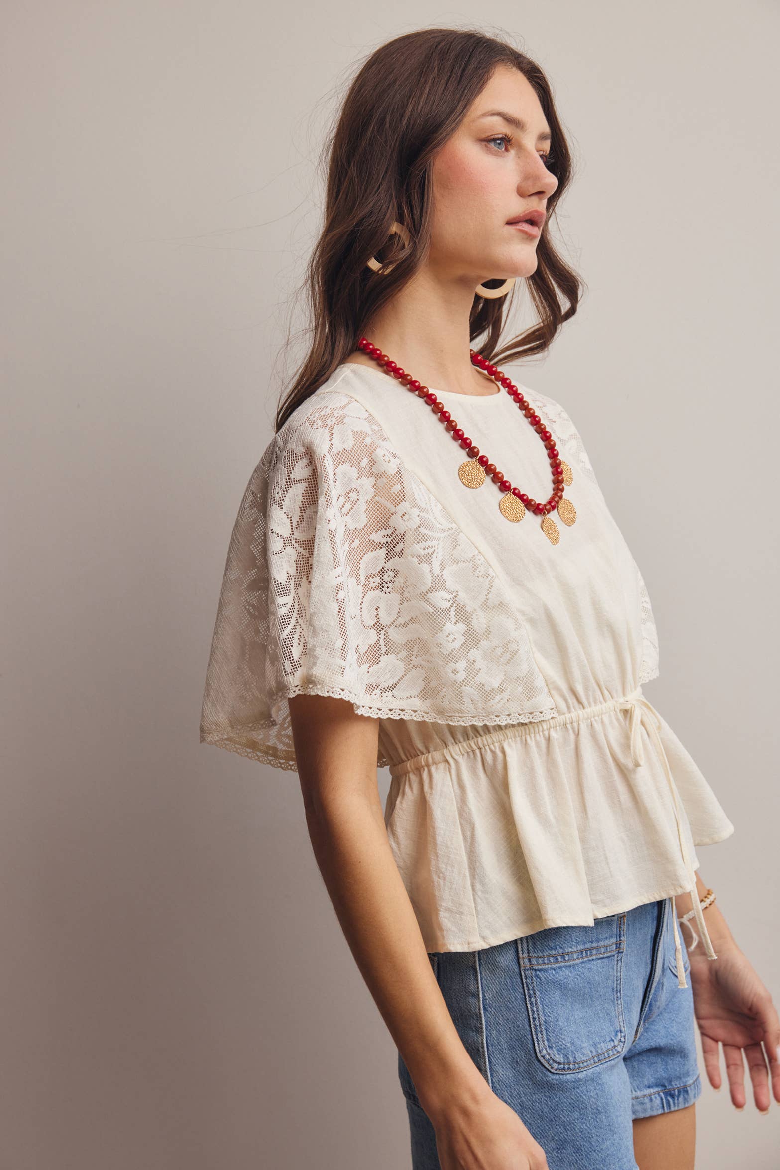 The Iris Peplum Top