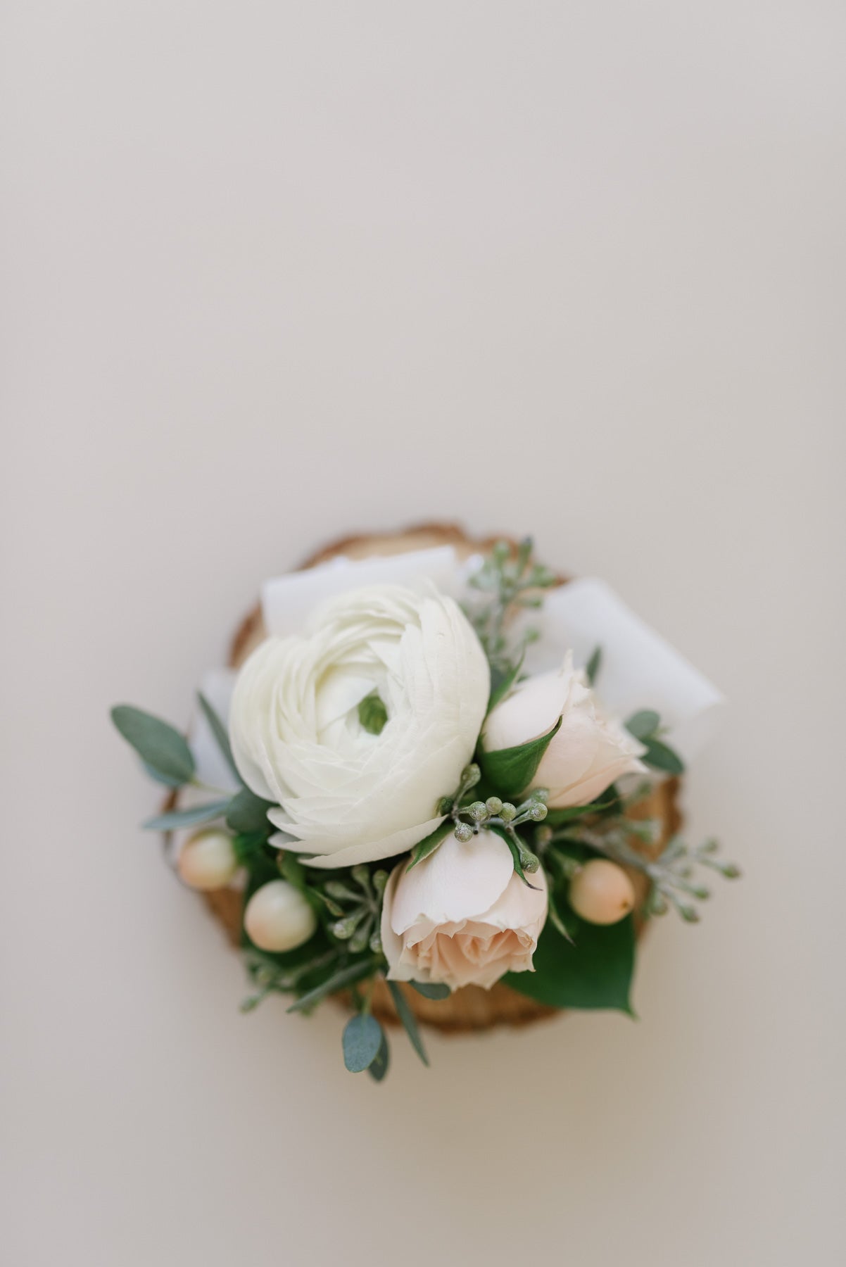 White and cream boutonnieres