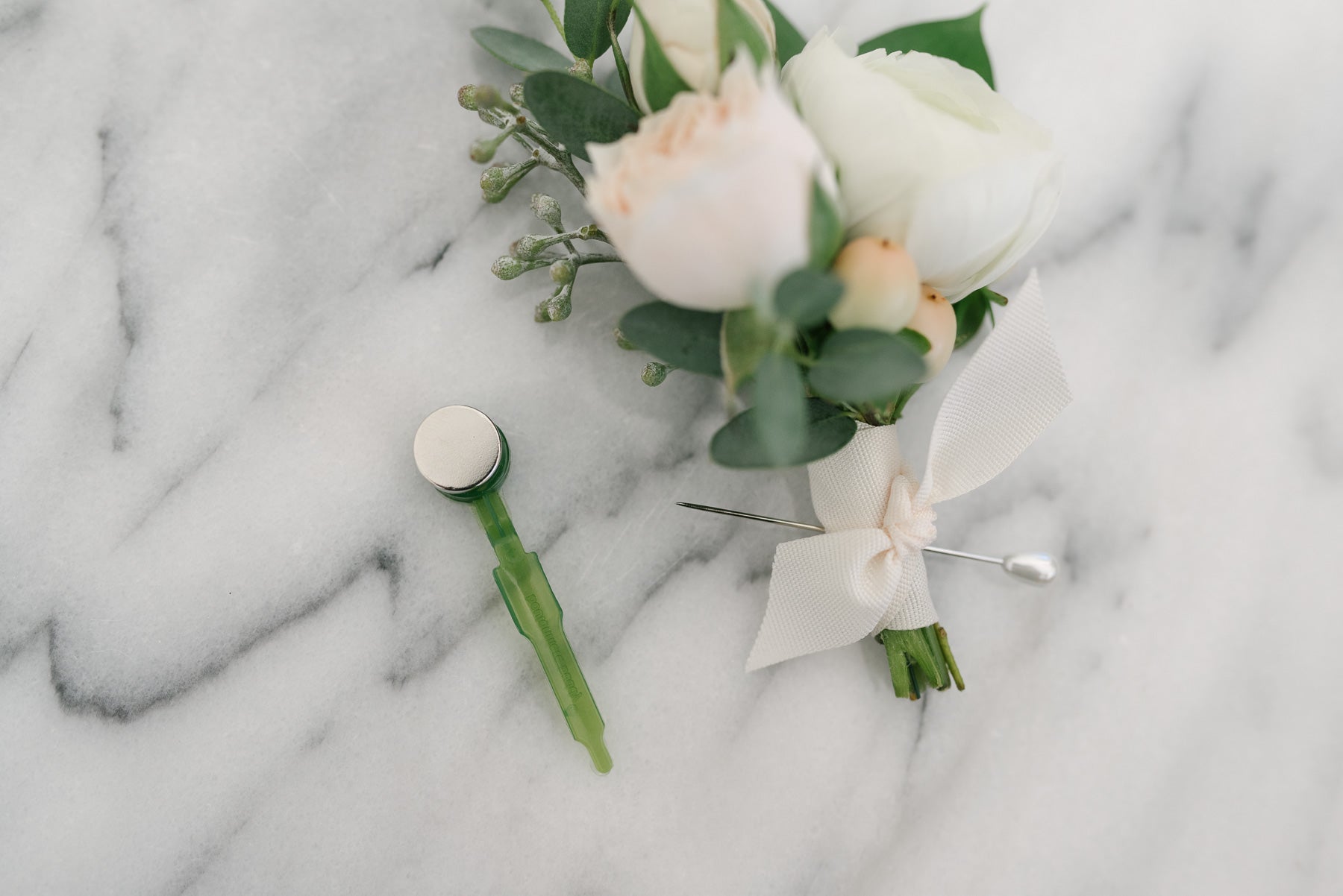 White and cream boutonnieres