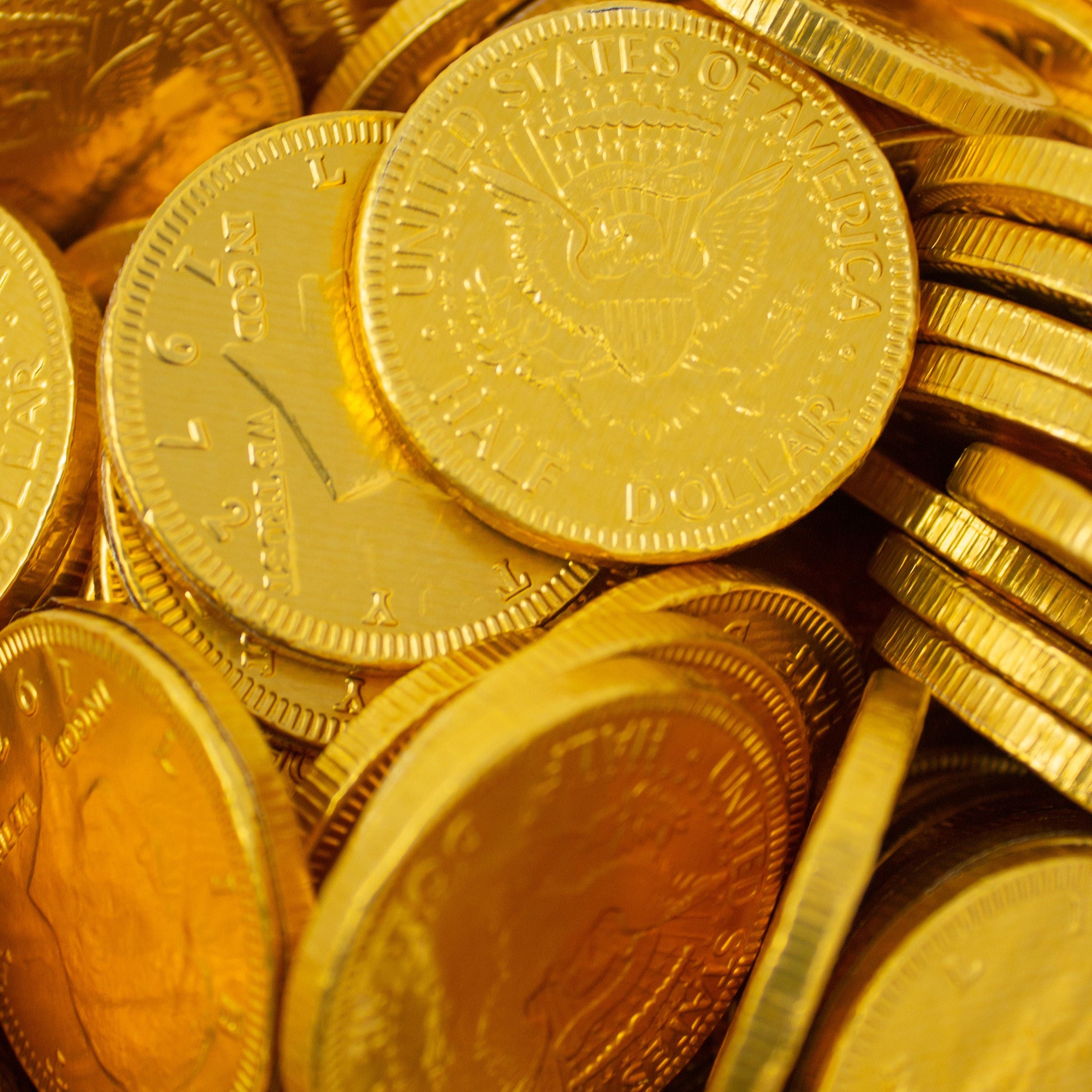 Product shoot of gold pot of gold chocolate coins. 